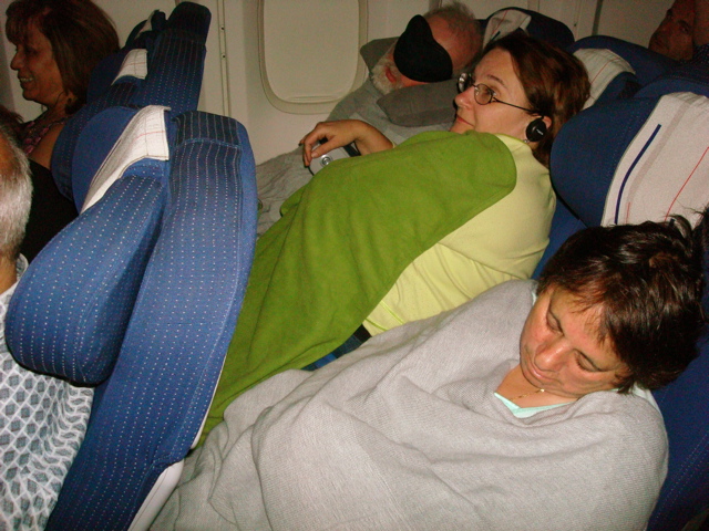 Robert, Ann, and oum Fadi on the plane to Paris (sy)