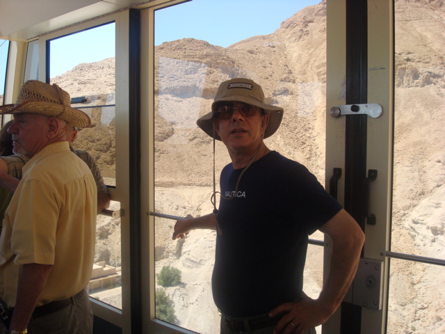 Salim going down in the cable car from Masada (sy)