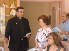 Father Samer presents our donation to the Four Homes of Mercy in Bethany (sy)