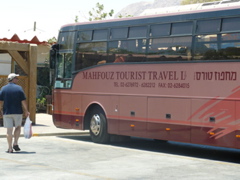 David and our tour bus from Mahfouz Tourist Travel Ltd (rw)