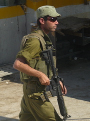 Soldier at checkpoint on the road near Jericho (rw)