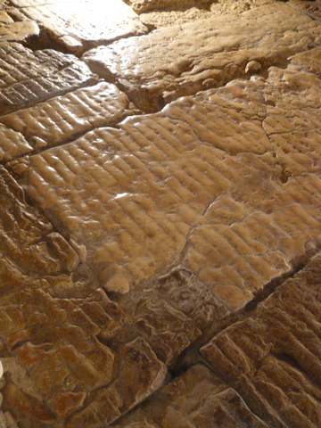 The Lithostratos, pavement grooved by the wagon wheels from Roman times (rw)