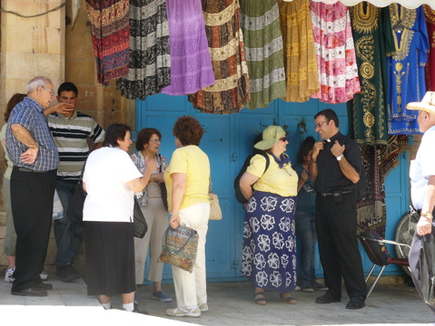 Subi, Paul, oum Fadi, Wibab, Lilian, Ann, Father Samer, and George in the market, Old Jerusalem (rw)