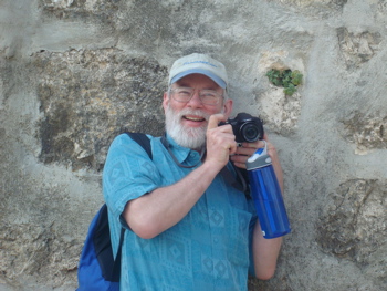 Robert up against the wall, taking group picture (sy)