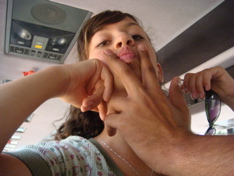 Natalia playing around in the bus (hs)