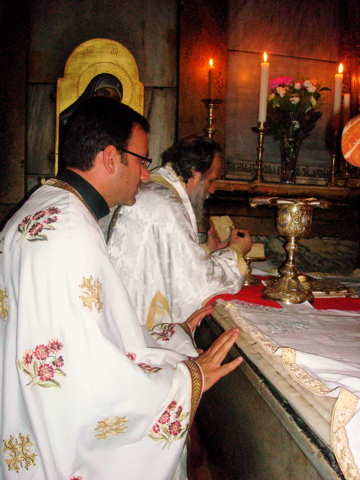  Father Samer with the Bishop preparing the Host for the Liturgy, in the Holy Sepulchre (sy)