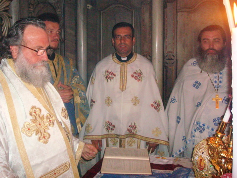 The Bishop, Deacon, Father Samer, and Priest in the Holy Sepelchre during Liturgy (sy)