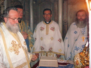 The Bishop, Deacon, Father Samer, and Priest in the Holy Sepelchre during Liturgy (sy)