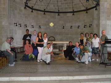 Group photo near the rock of the loaves and fishes - Edmond, Minerva, Paul, Ann, Robert, Alma, Suad, Salim, oum Fadi, Father Samer, Fuad, David, Ursula, Rowida, Natalia, Rafiha, George (rw)