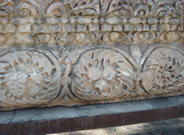 Stone Lentel showing decorative grapes  pomogranates, from Jewish-Christian community in Capernaum (sy)