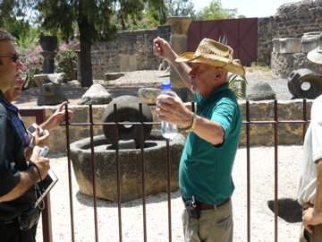 George explains how they used to handle olives "this big!" in the stone olive press, at Capernaum (rw)