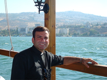 Boat ride on Sea of Galilee - Father Samer and our destination, Tiberias (sy)