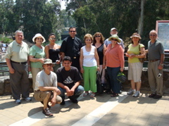 Group photo at the River Jordan - Edmond, Lilian, Ursula, Salim, Paul, Father Samer, Suad, Alma, Ann, Robert, Rowida, George (sy)