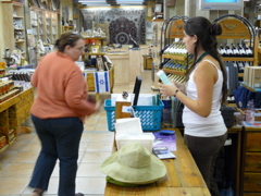 Ann doing price check at the Yardenit gift shop (rw)